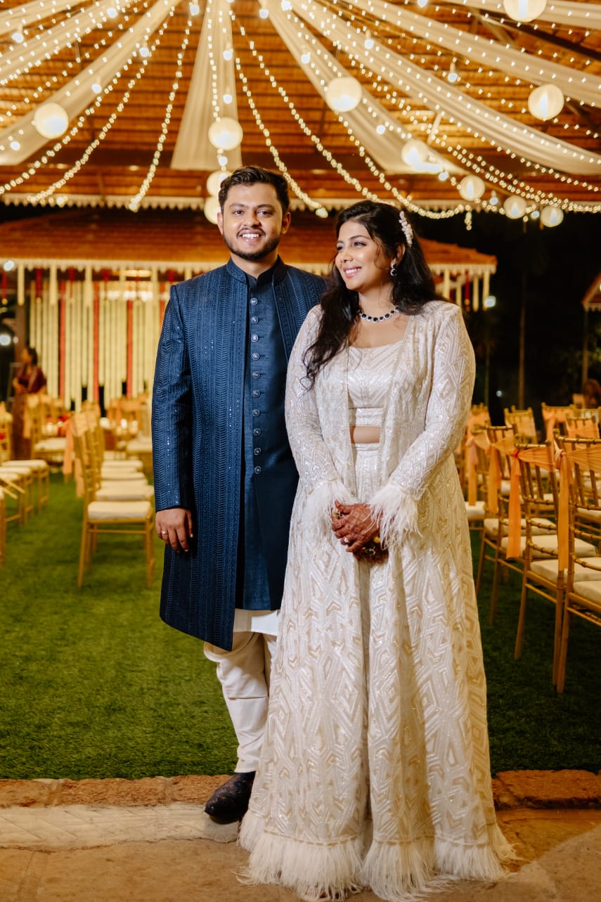 Couple Under String Lights